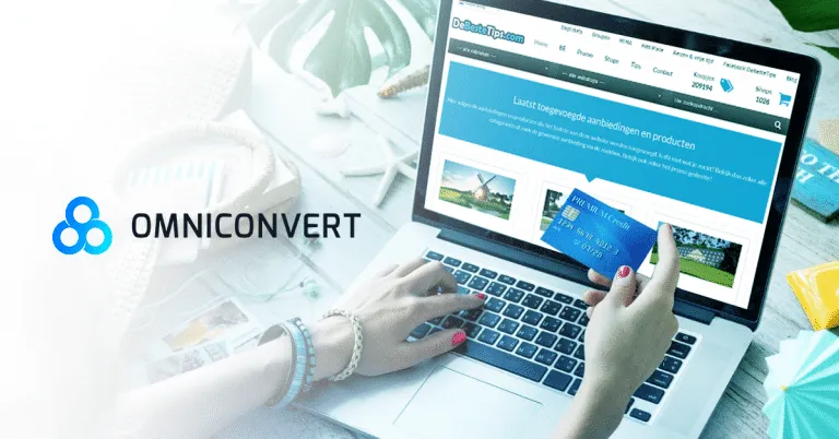A woman is using a laptop to perform product page optimization with the word omniconvert on it.