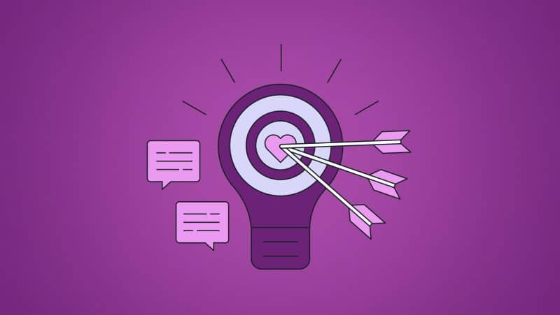 Graphic of a lightbulb with a target inside, arrows hitting the center, and speech bubbles, symbolizing targeted communication.